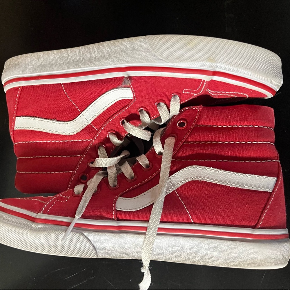 Red high top vans.